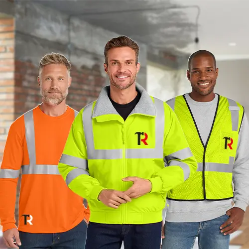Three construction crew members wearing custom reflective uniforms and safety vests